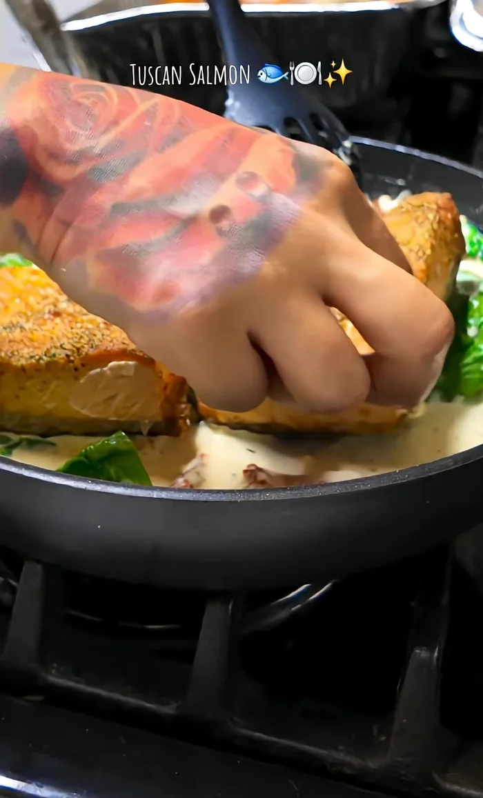 Add cooked salmon to the sauce and simmer for about 10 minutes.