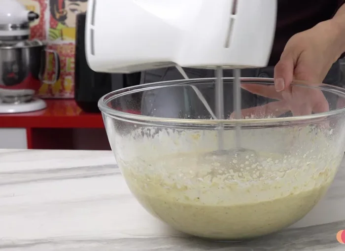 Combine all ingredients and pour the batter into a greased and floured cake tin.