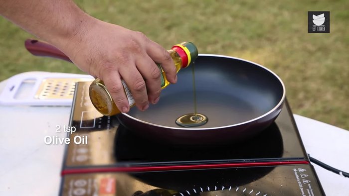 Heat olive oil in a pan. Add garlic and cook until fragrant.