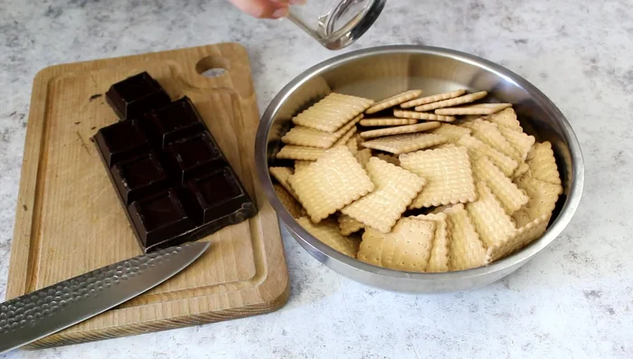Crush the Petit biscuits into small pieces using the bottom of a glass.