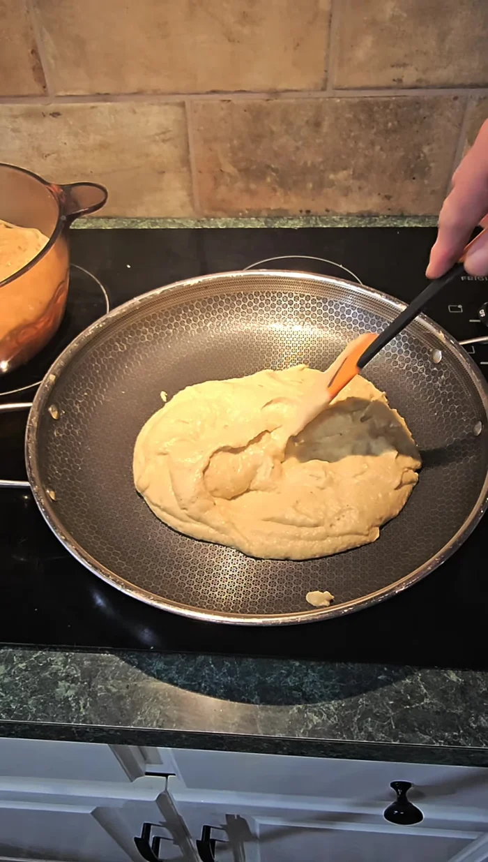 Return the sauce to the pan and cook for about 30 seconds on medium heat.