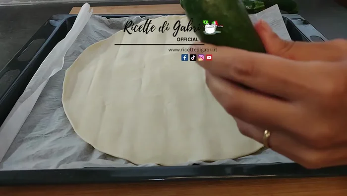 Cut the ends off the courgettes and use a mandolin to slice them thinly.