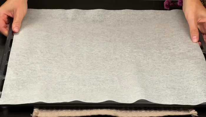 Preheat oven. Line a baking sheet with parchment paper.