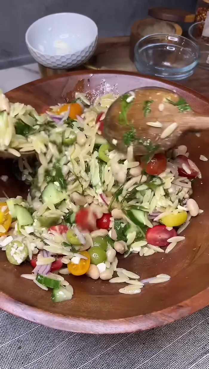 Add a little bit more dressing and toss.