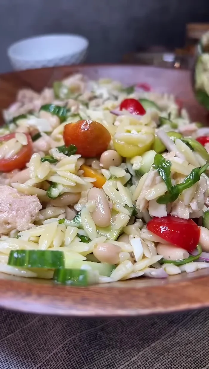 Add more dressing, feta cheese, chopped parsley, and cracked black pepper.