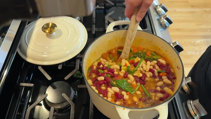 Add beans to the pot. Add a little water if needed. Cook until vegetables are tender.