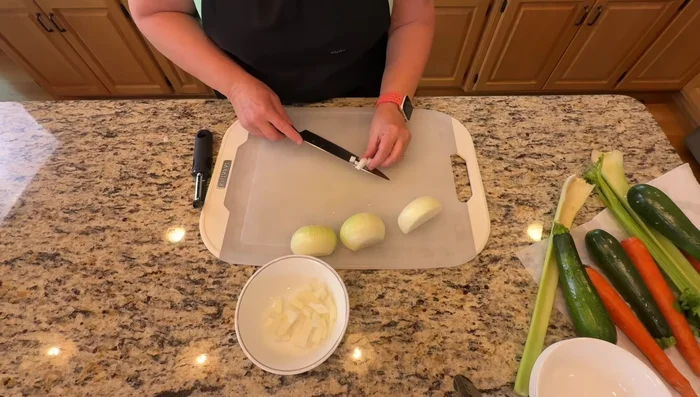 Wash and chop all vegetables into similar-sized pieces. Chop frozen green beans into bite-sized pieces.