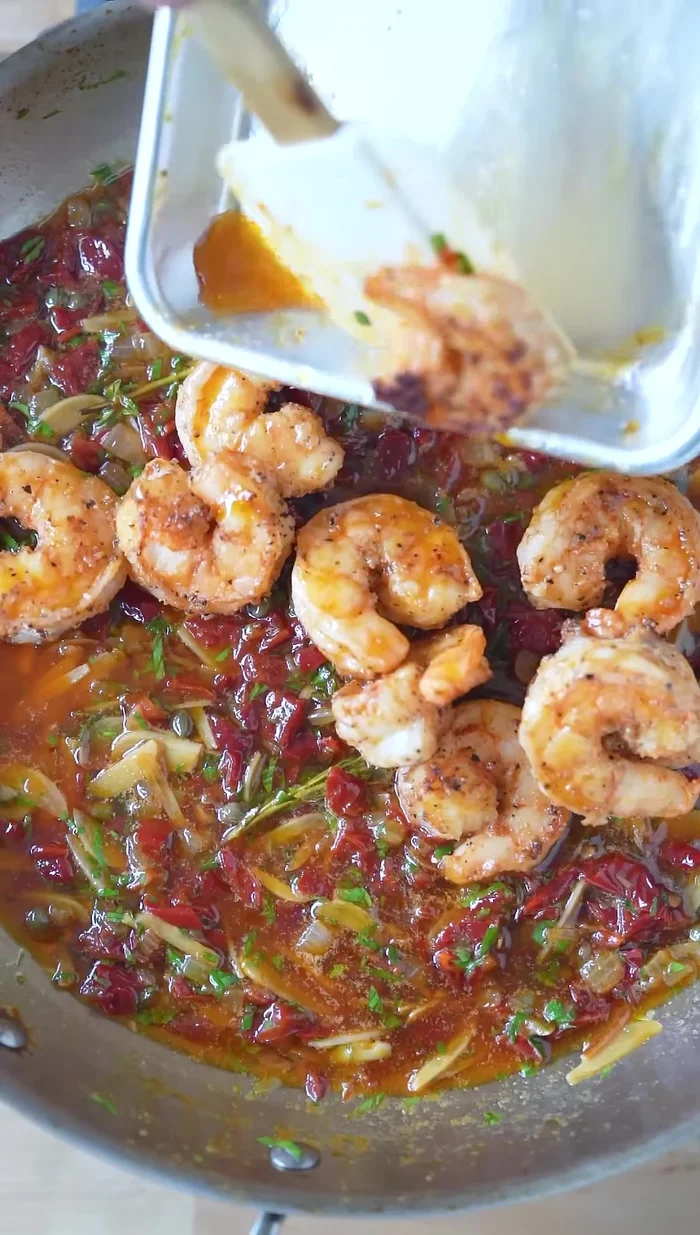 Add shrimp back and all drippings. Coat shrimp in the sauce.
