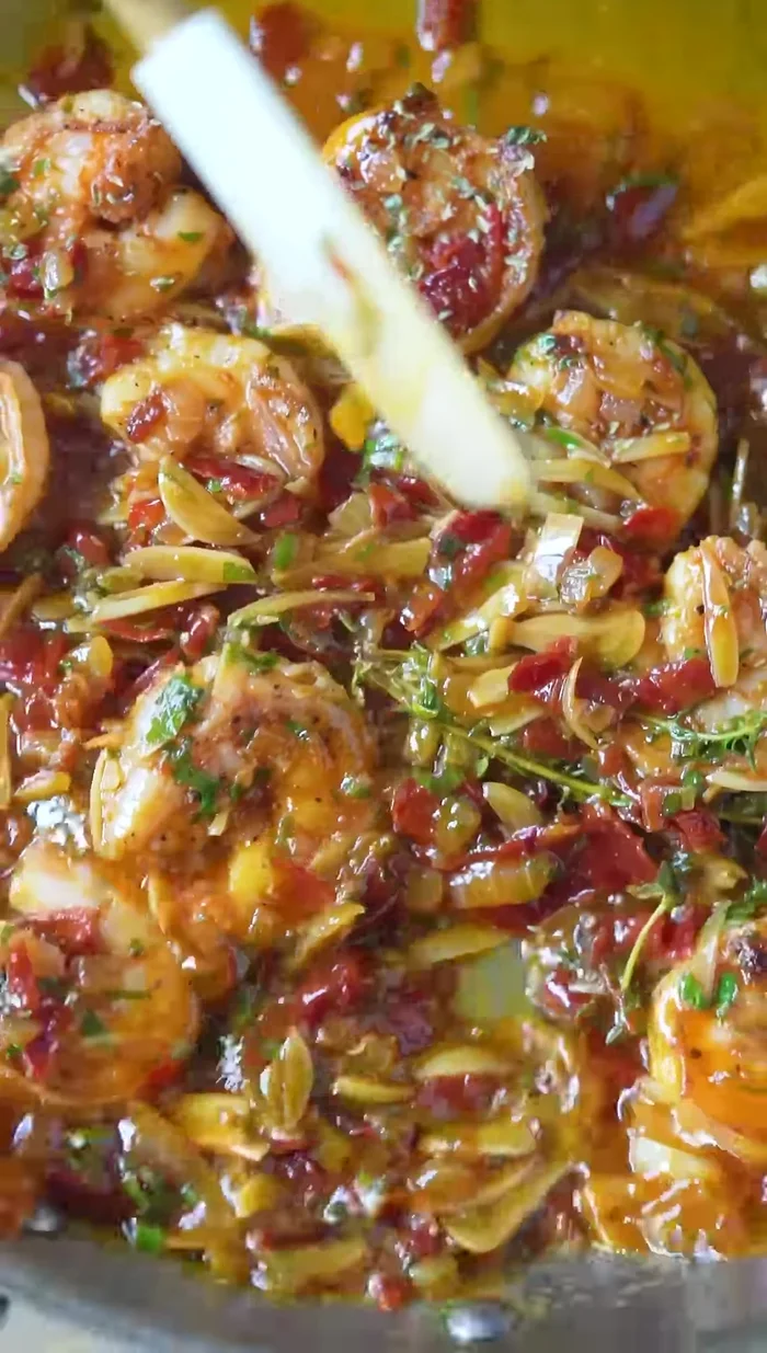 Add dry oregano. Cook shrimp for another 30-45 seconds.