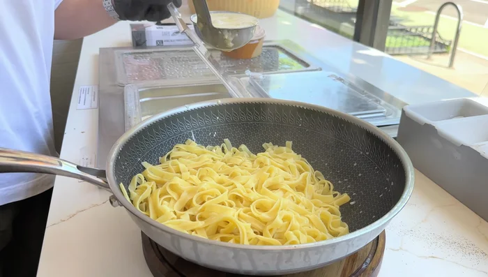 Prepare Alfredo sauce (recipe not provided, but you can use a store-bought version).