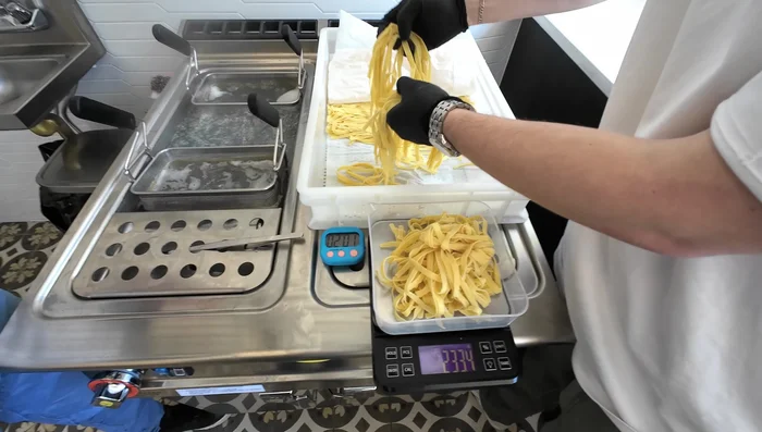 Boil fresh fettuccine according to package directions (approx. 2 minutes).
