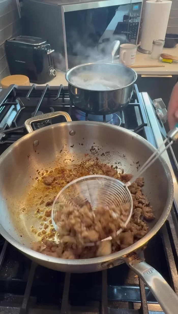 Boil the rigatoni pasta in salted water.