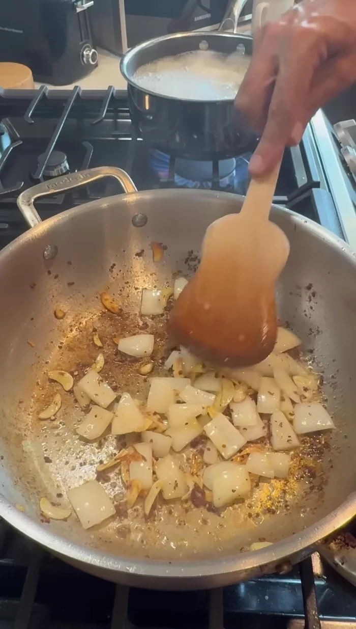 Deglaze the pan with red wine (Pinot Noir), scraping up any remaining browned bits.