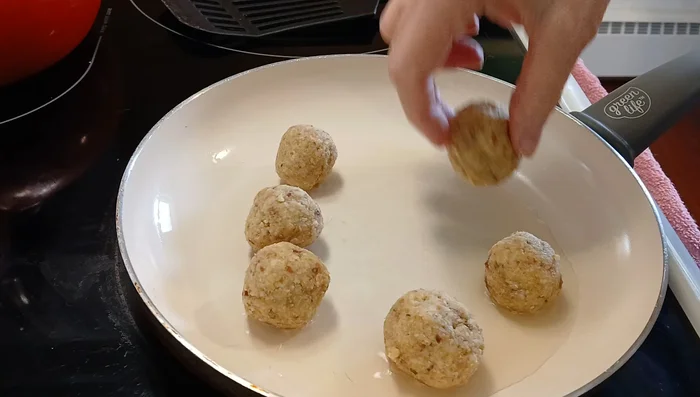 Heat a skillet with a small amount of avocado oil over medium-low heat. Add the bread balls and brown them on all sides, turning occasionally to prevent sticking and burning.