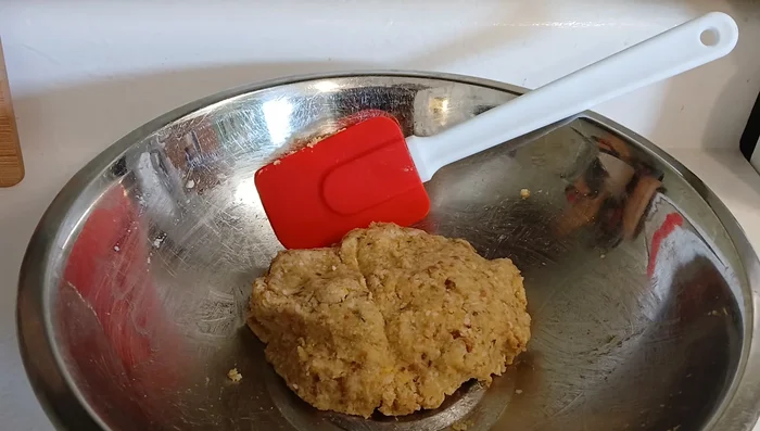 Combine leftover stuffing mix, one egg, and 1/4 cup of shaker cheese in a bowl. Mix well with your hands.