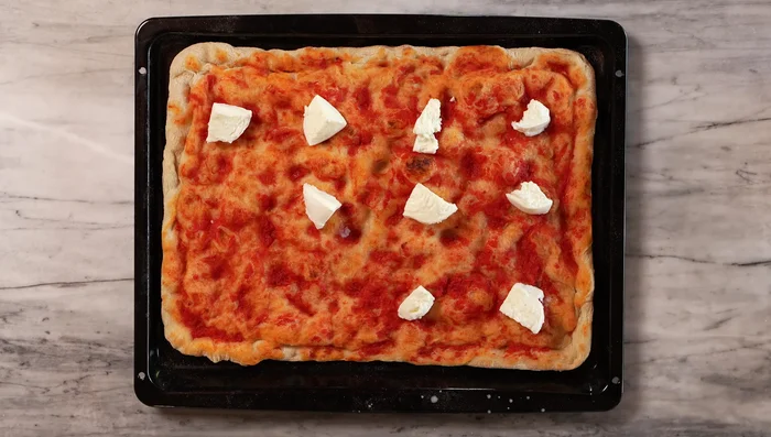 Add mozzarella and second bake: Add mozzarella cheese. Bake for another 4-6 minutes until the cheese is melted and bubbly.