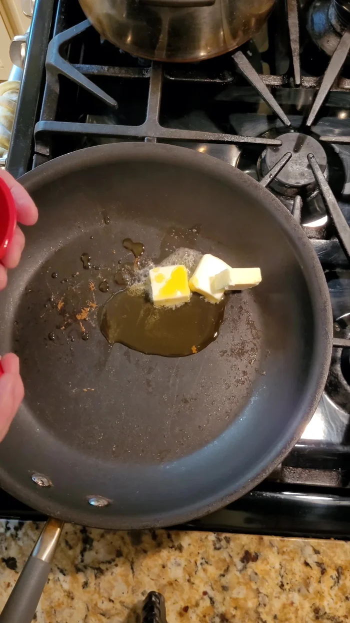 Add oil and butter to the pan over medium heat. Once melted, add shallot and stir until translucent.