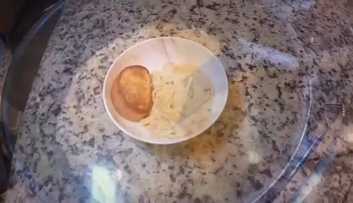 Add the sautéed shrimp mixture to the pasta and stir to combine.