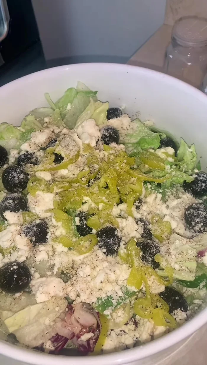 Add parmesan cheese and vegetable oil (vegetable oil used instead of olive oil due to the creator's taste bud sensitivity).