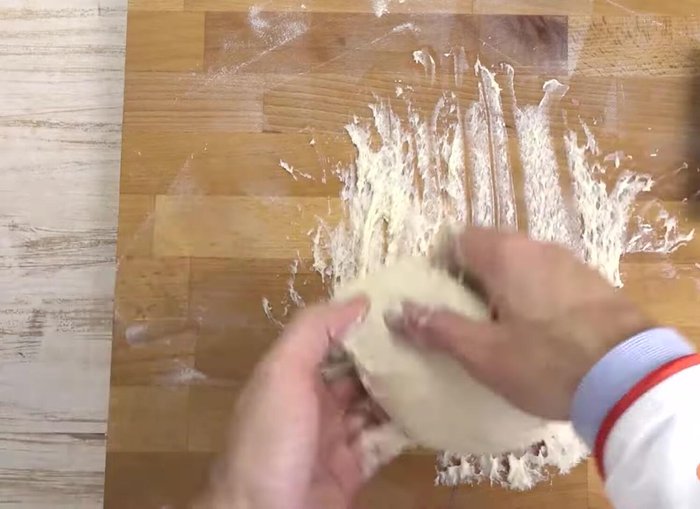 Spread the chopped onions evenly over the dough.