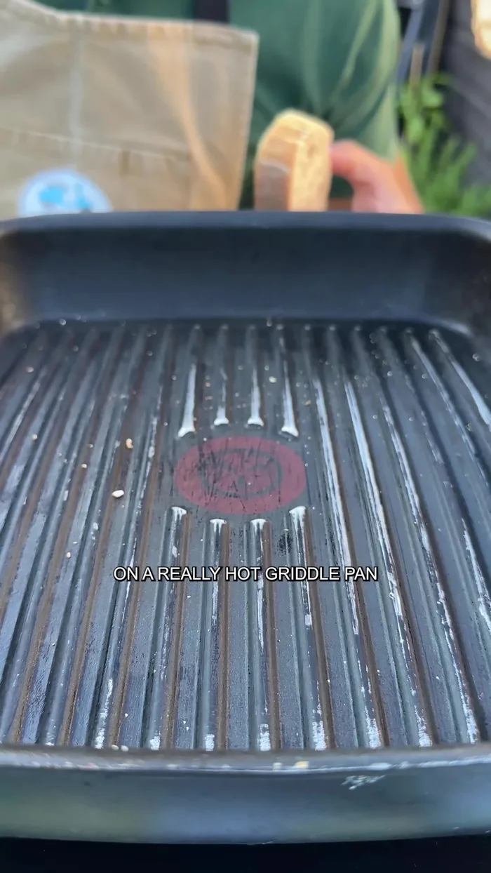 Toast the bread on both sides on a hot griddle pan.