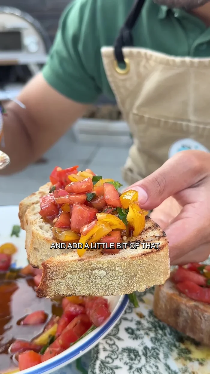 Top the toasted bread with the tomato mixture and add a little dressing.