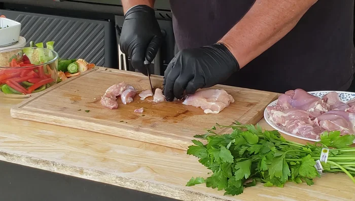 Cut chicken thighs into bite-sized pieces.