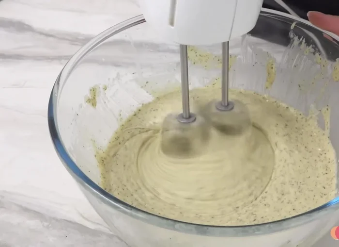 Transfer the batter to a greased and floured pancake pan.