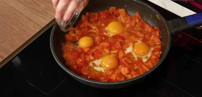 Season the egg whites with salt and pepper.
