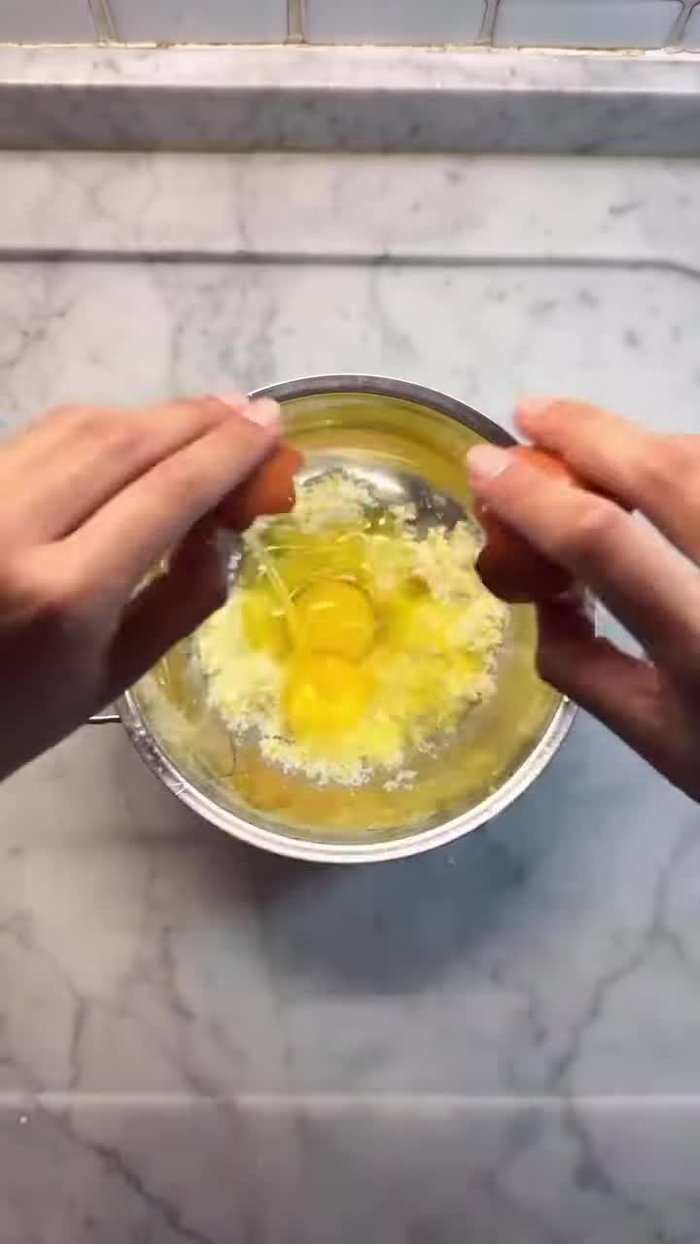 Add eggs and mix with a whisk.