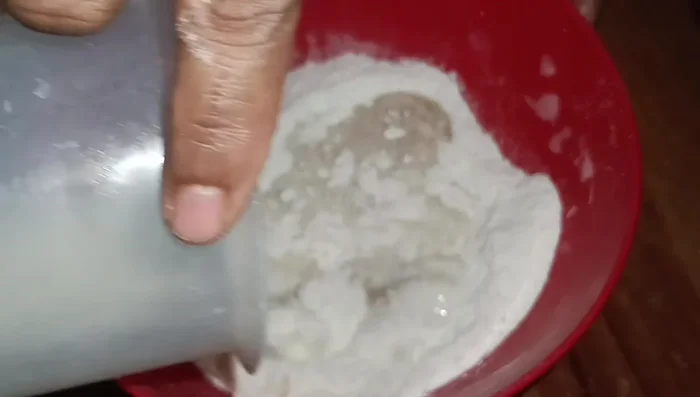Add milk and beat at slow speed until combined.