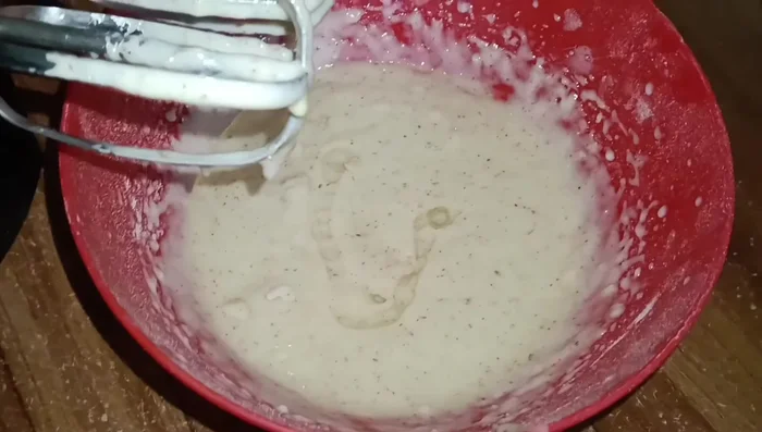 Add vegetable oil and beat at slow speed until well combined.