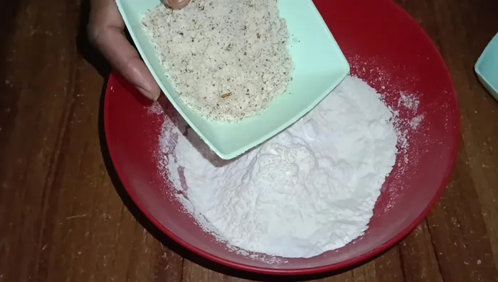 Add sugar powder, almond powder, and vanilla essence to the dry ingredients. Mix well.